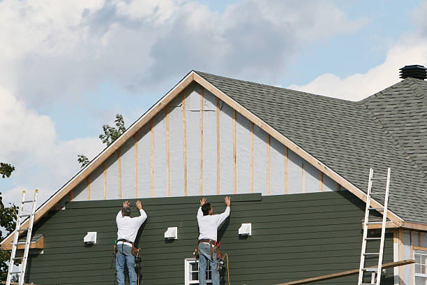 Professional Vinyl Siding technician working in Great River, NY